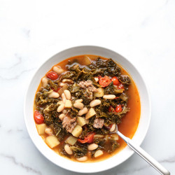 Portuguese Kale Soup With Linguica And Cherry Tomatoes