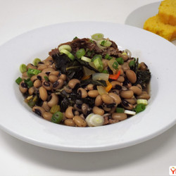 Braised Pork With Black Eyed Peas And Greens