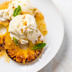 Charred Pineapple With Spiced Honey And Coconut Ice Cream