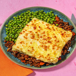 Hearty Bacon, Lentil And Mushroom Cottage Pie With Cheesy Mash Top And Peas