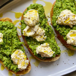 Smashed Pea Toasts With Ricotta