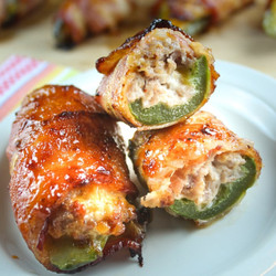 Sausage Stuffed Jalapenos Wrapped In Bacon