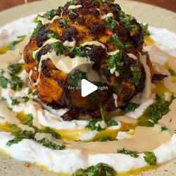 Whole Roast Cauliflower With Roasted Garlic Yoghurt, Chimichurri + Tahini