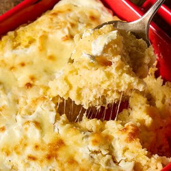 Romanian Baked Polenta With Sour Cream And Cheese