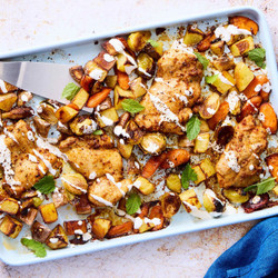 Sheet Pan Roasted Harissa Chicken Thighs With Potatoes, Brussels &amp; Garlicky Sour Cream