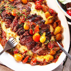 Seared Skirt Steak With Blistered Cherry Tomatoes And Polenta