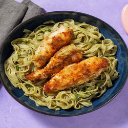 Chicken fillets in herb breading with fettuccine and homemade pesto