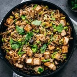 Vegan Rice Noodles With Crispy Tofu And Mushrooms