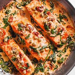 Creamy Tuscan Salmon With Spinach, Artichokes, And Garlic