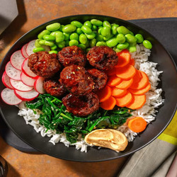 Bibimbap with organic ground beef balls, edamame, sesame spinach &amp; pickled radishes